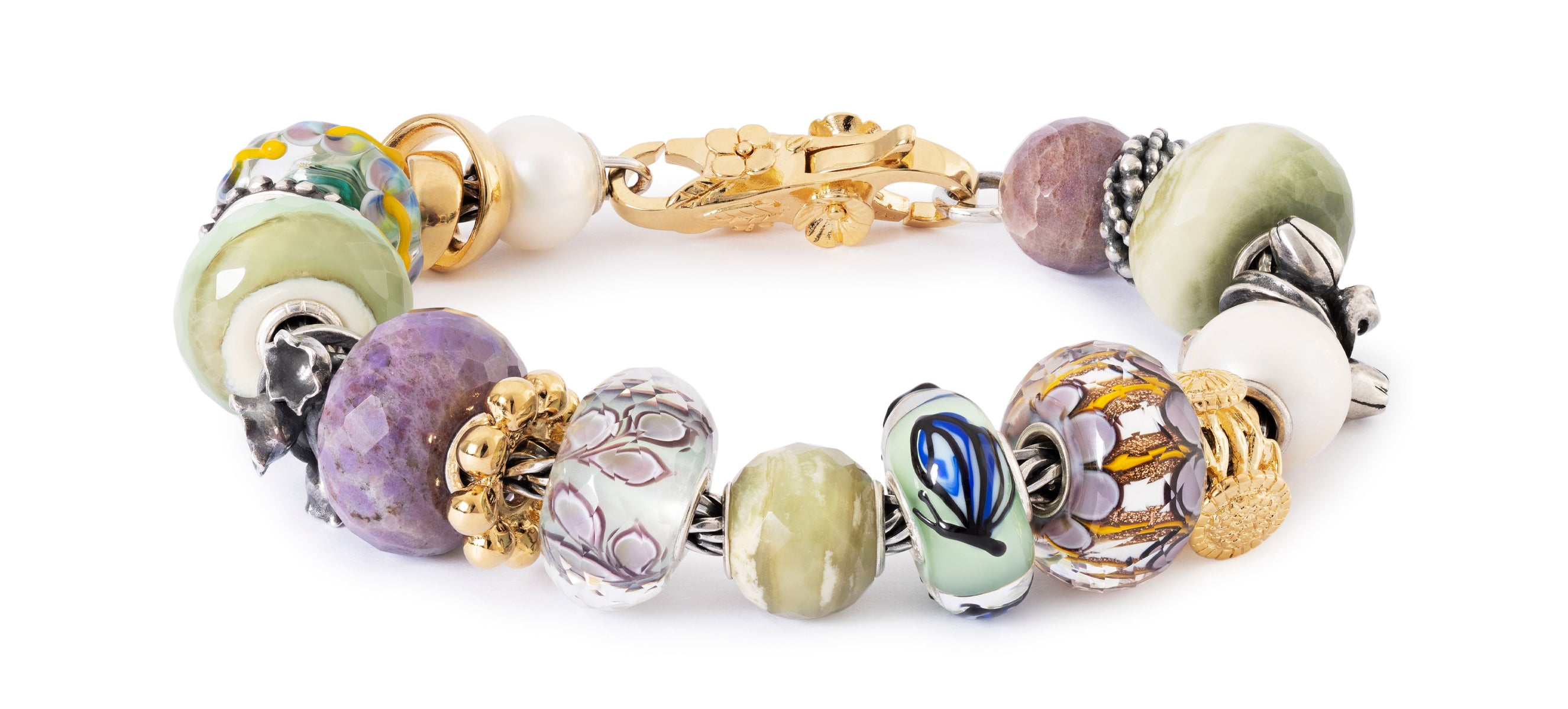 Colorful beaded bracelet with gold accents on a white background